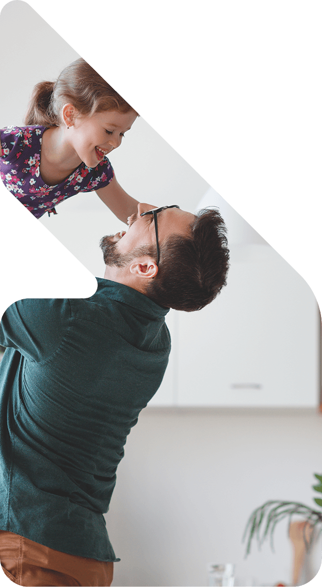 Image showing a Dad lifting his daughter above his head