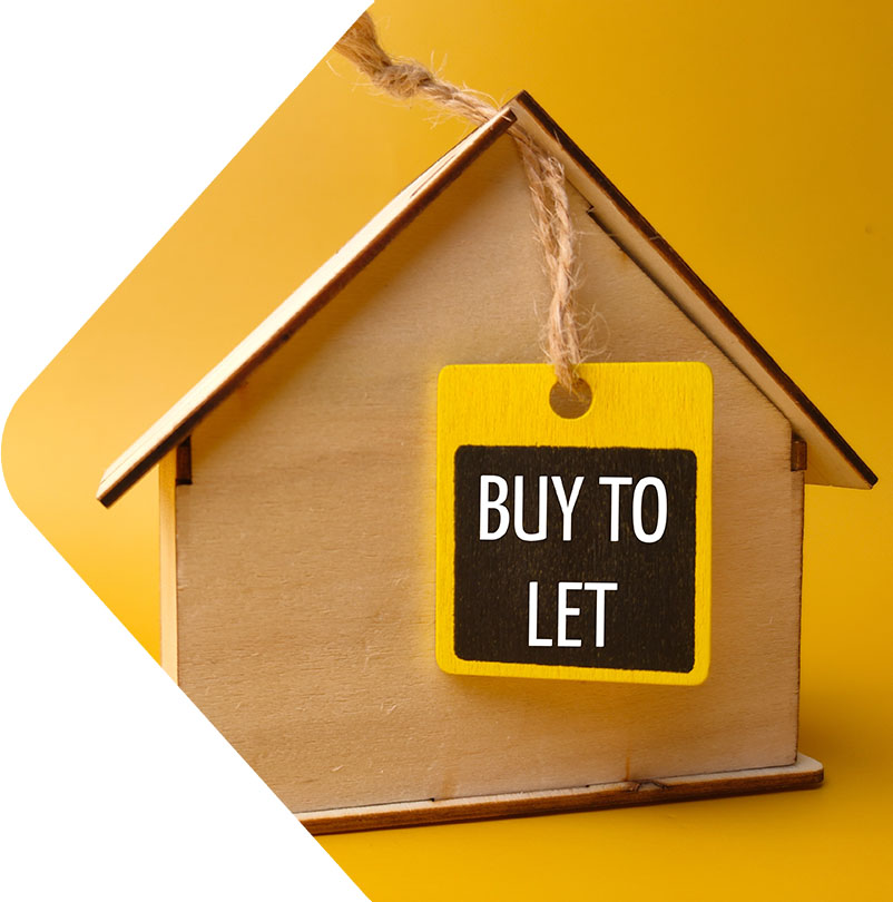 Image showing a model house with a "Buy to let" sign on it