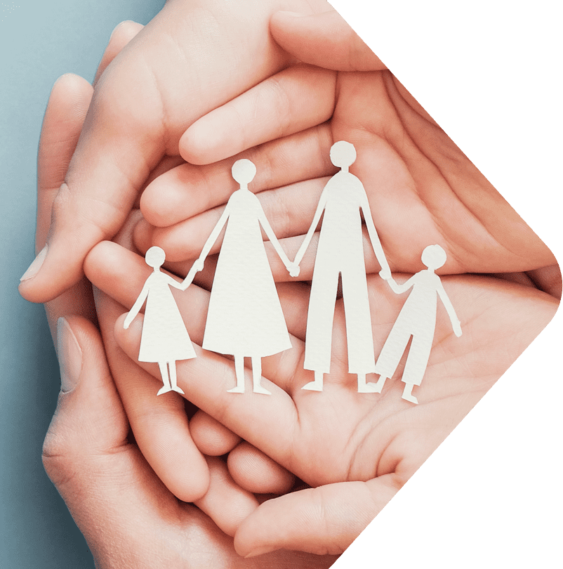Image showing 2 sets of hands holding a paper family