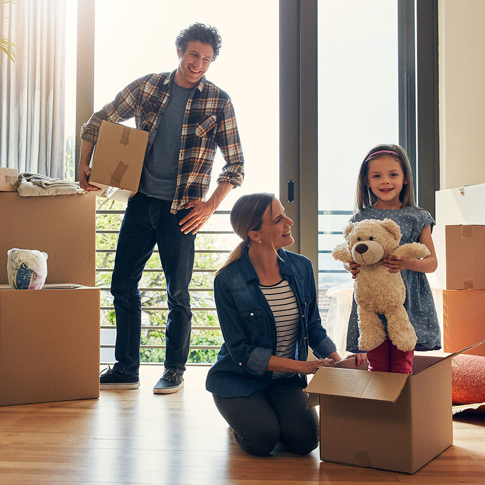 Image showing a family with packing boxes