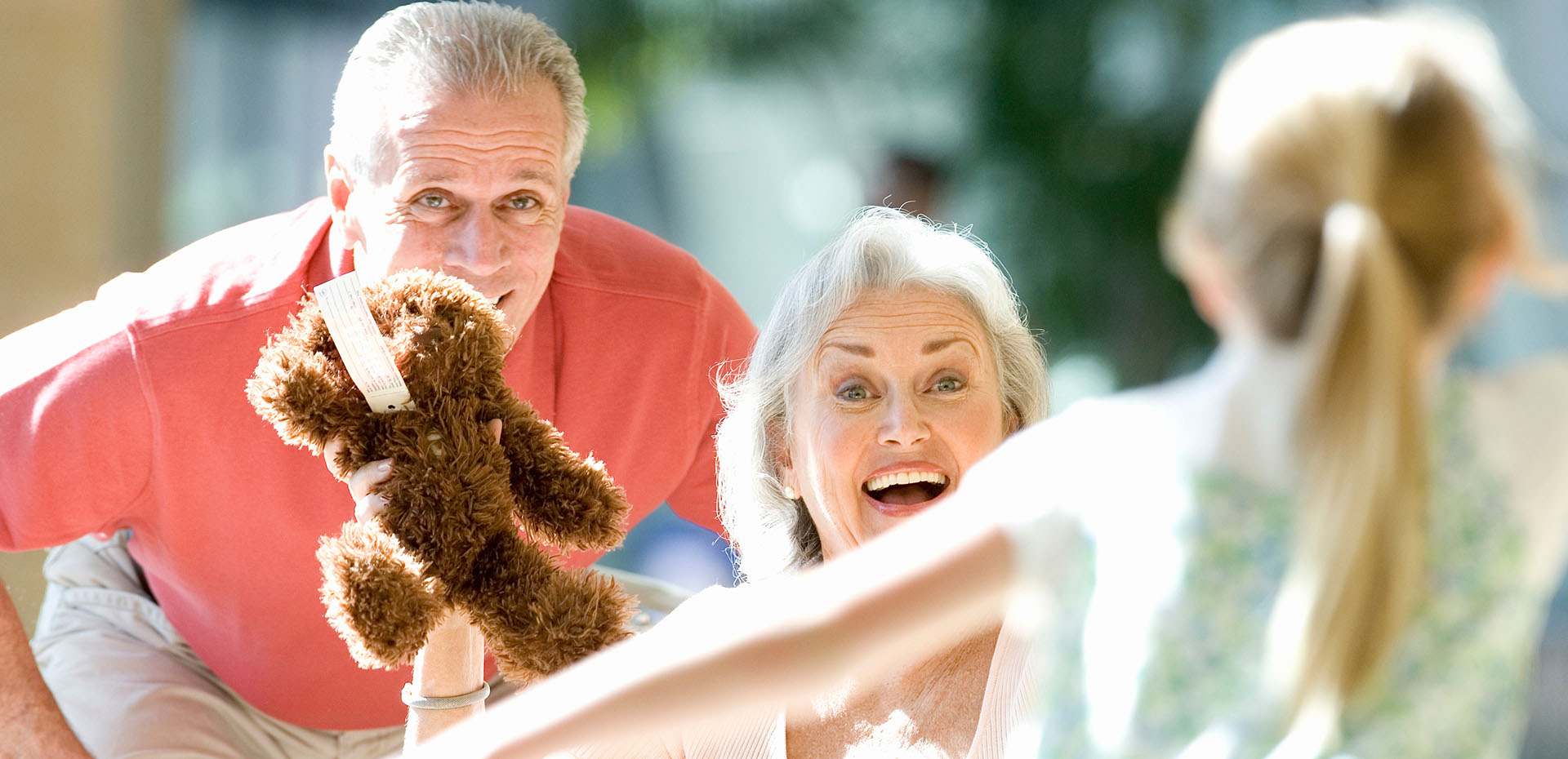 Image showing grandparents greeting their granddaughter at the airport