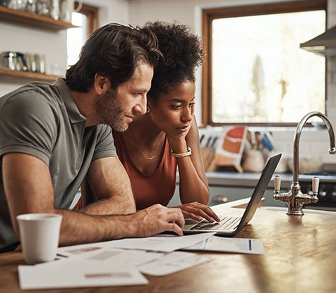 Image showing a couple on their laptop