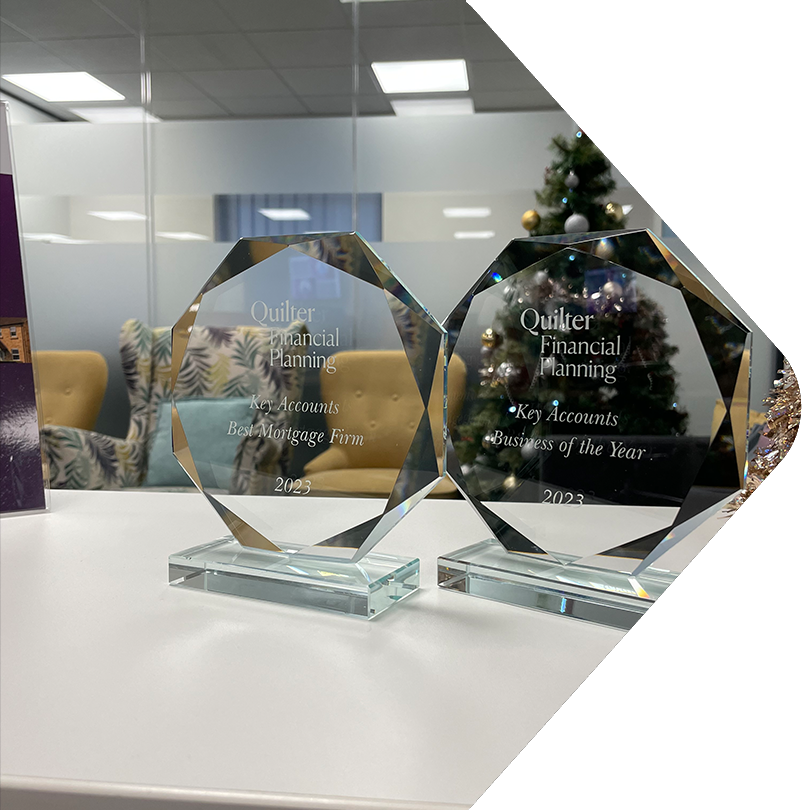 Photo of 2 glass awards on a table