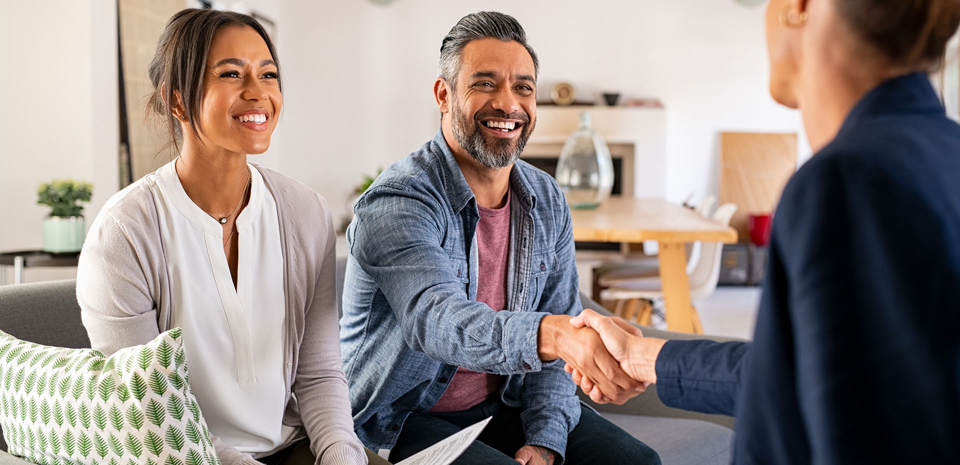 Image showing a couple in a mortgage appointment with a broker