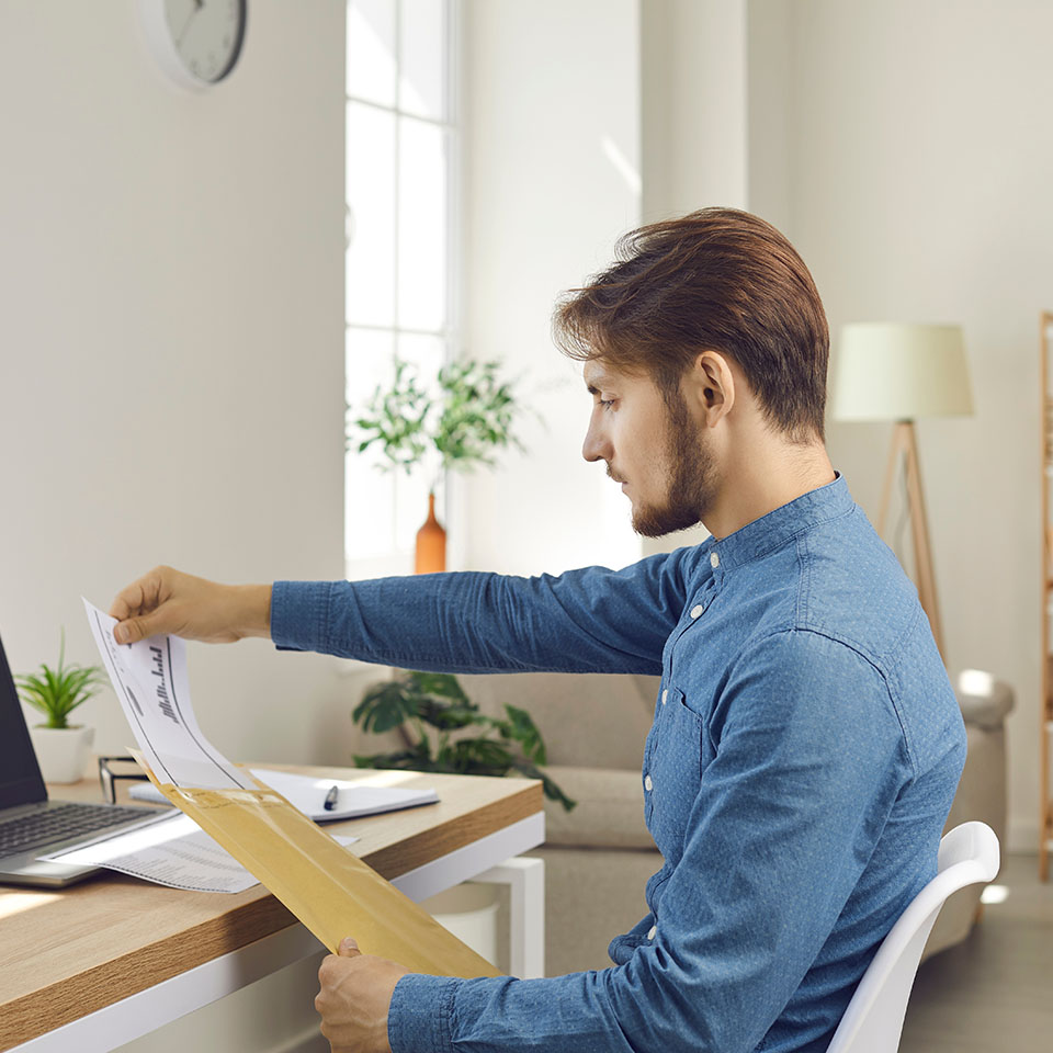 Image showing a man organising paperwork