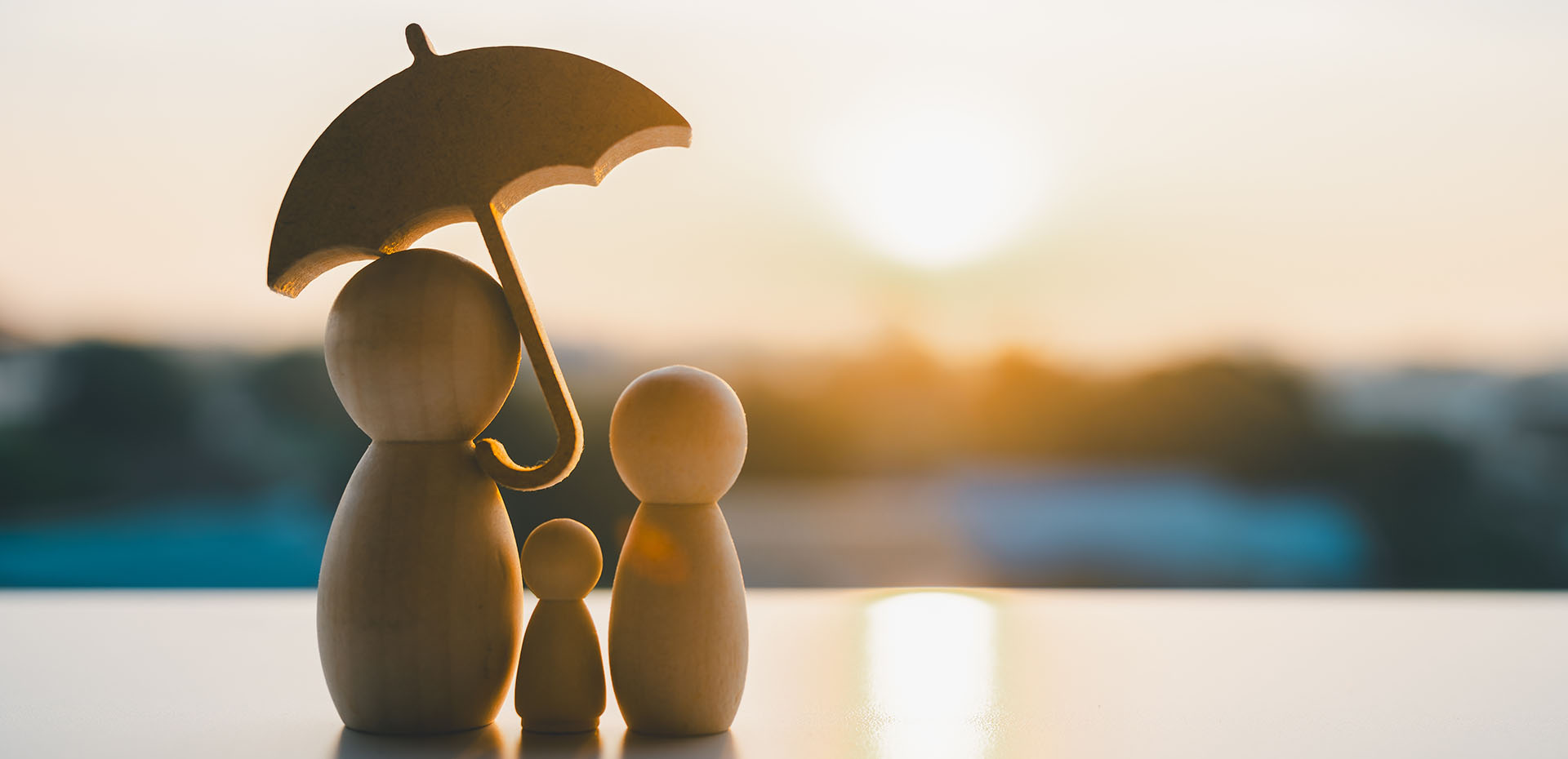 Image showing a model family holding an umbrella