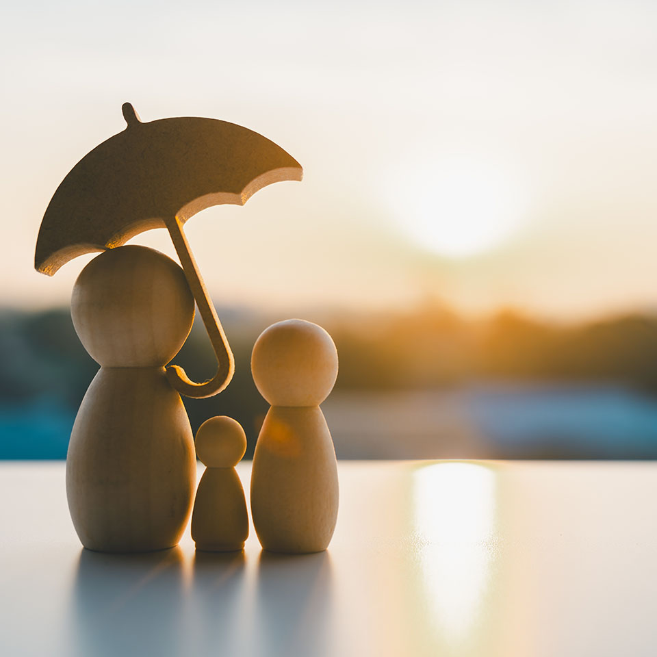 Image showing a model family holding an umbrella