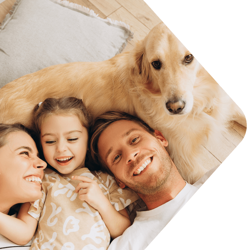 image showing a happy family with a dog