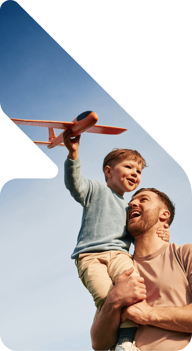 Image showing a father playing with his son with a plane