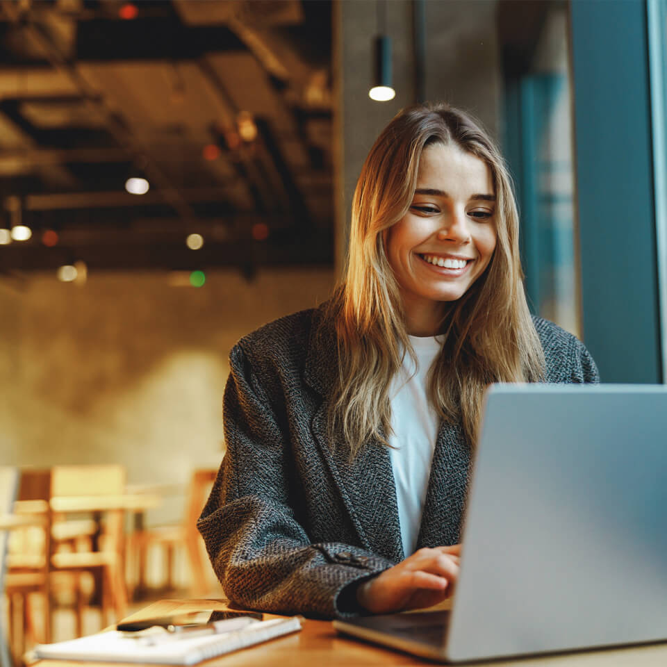 Image showing a lady working on a laptop