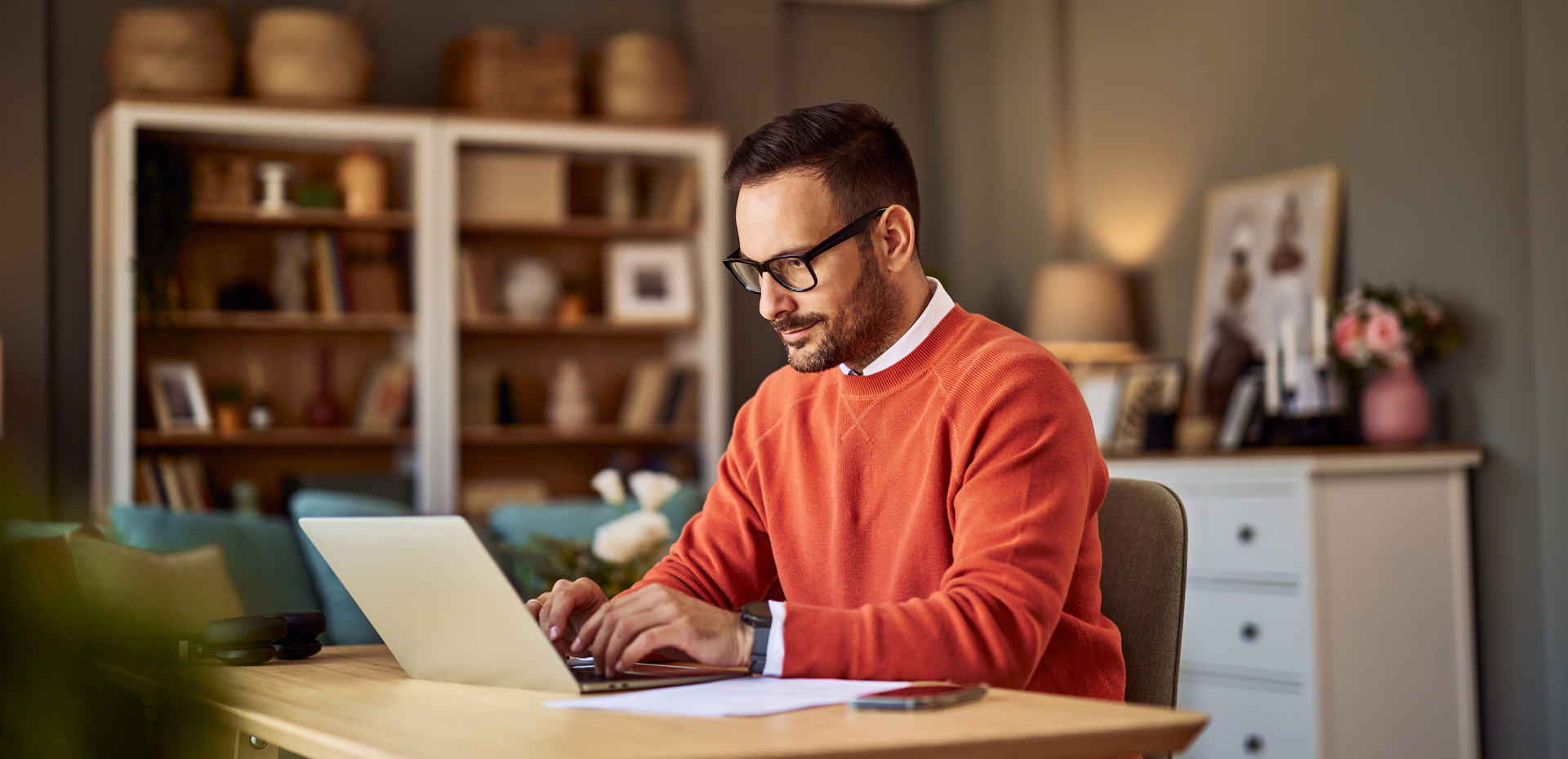 Image showing a man working on laptop at home