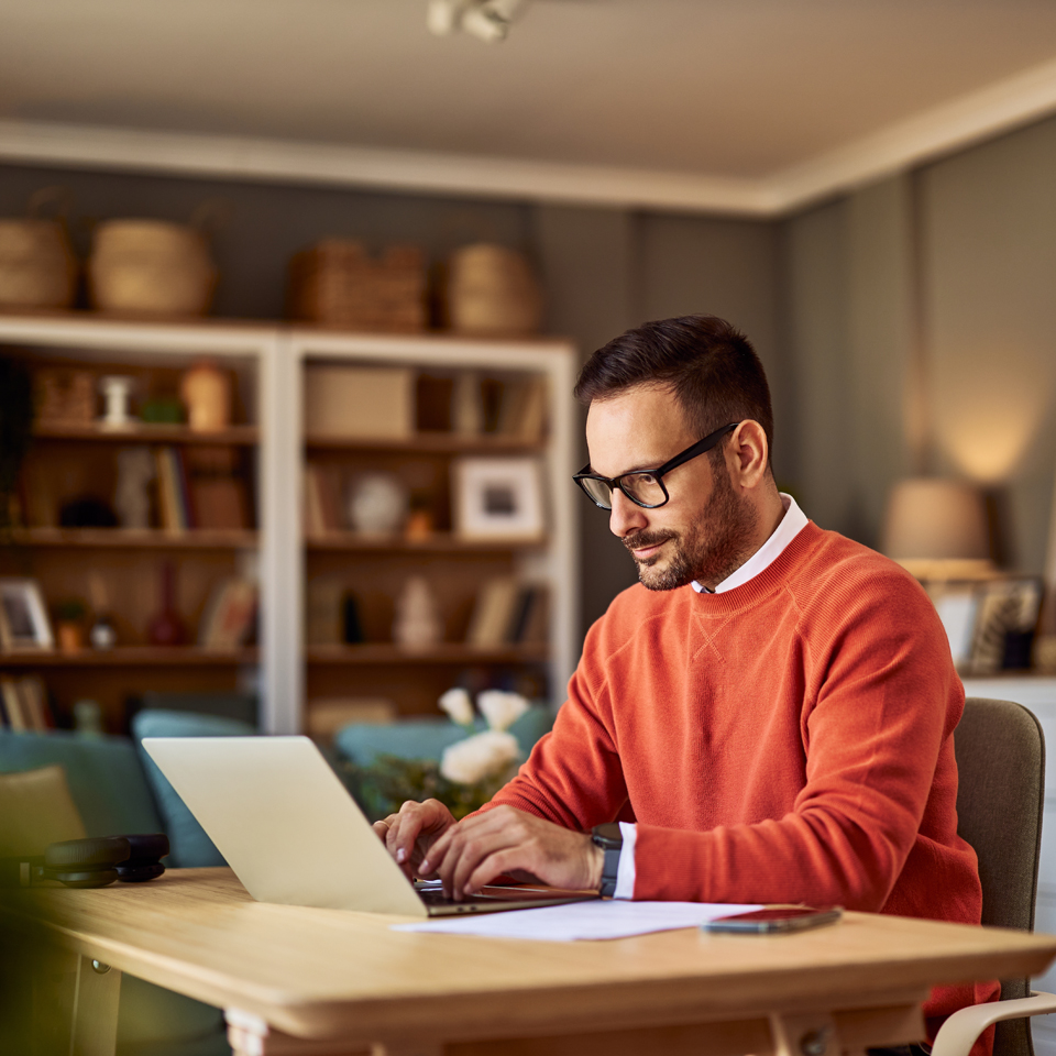 Image showing a man working on laptop at home