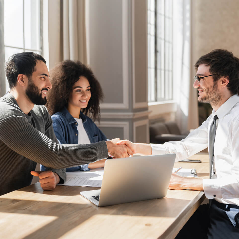 Image Showing couple handshake mortgage officer worker
