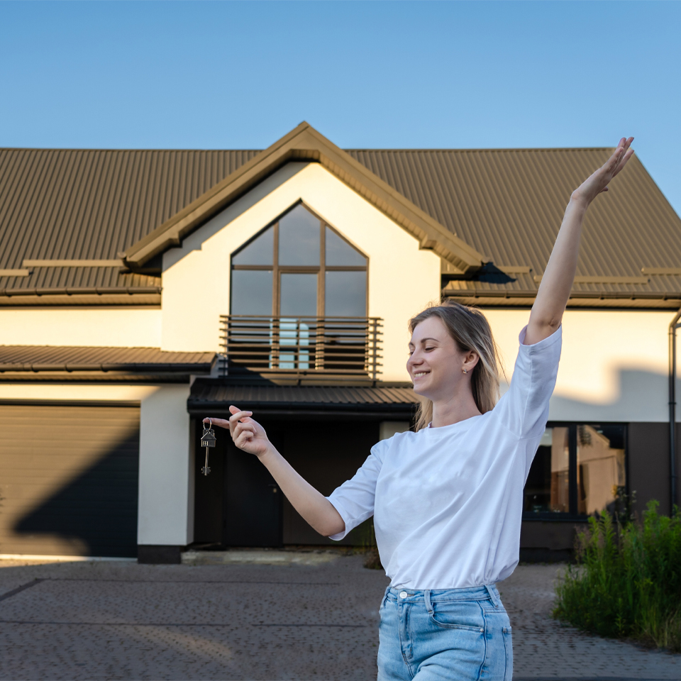 Happy girl in a new house