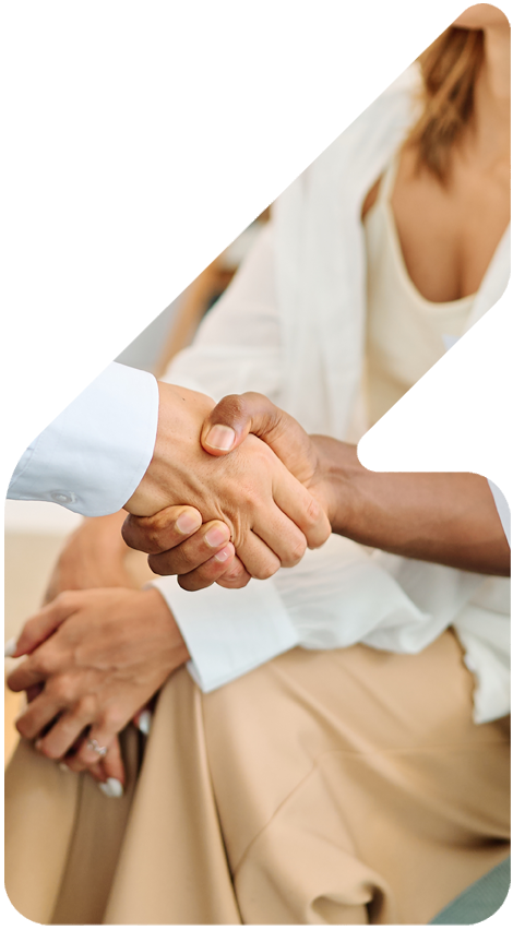 image showing couple and agent shaking hands 
