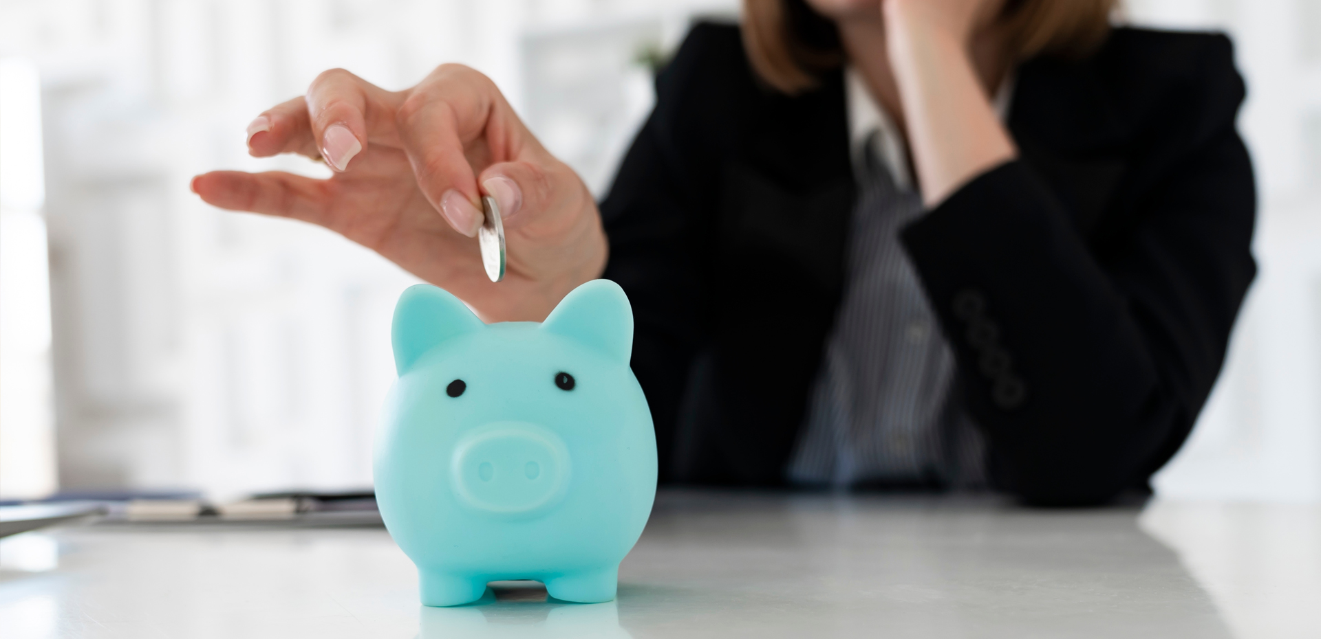 image showing a girl trying to save money