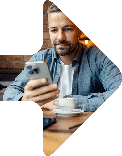 Image showing a man sitting using his phone