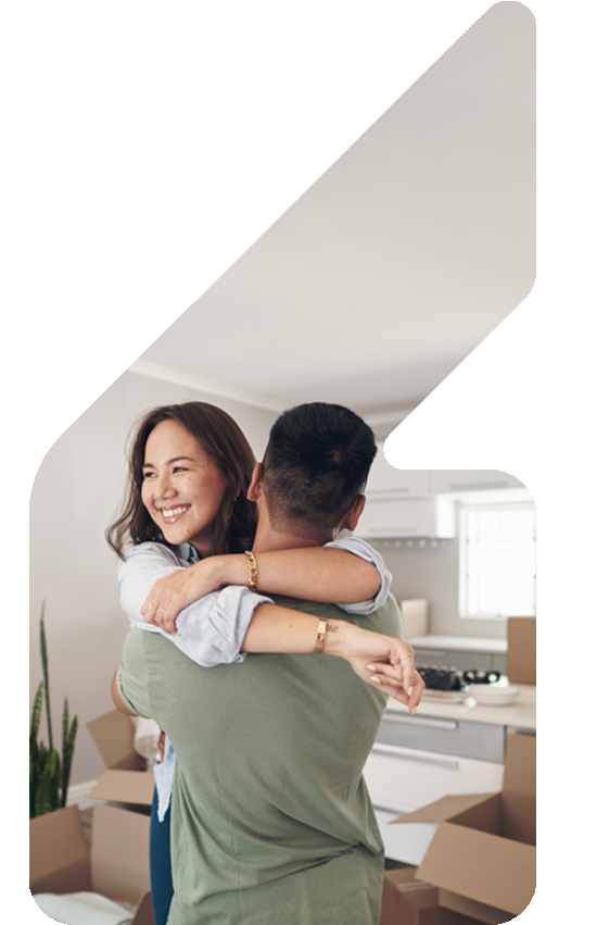 Image showing a couple facing away from the camera with arms round each other