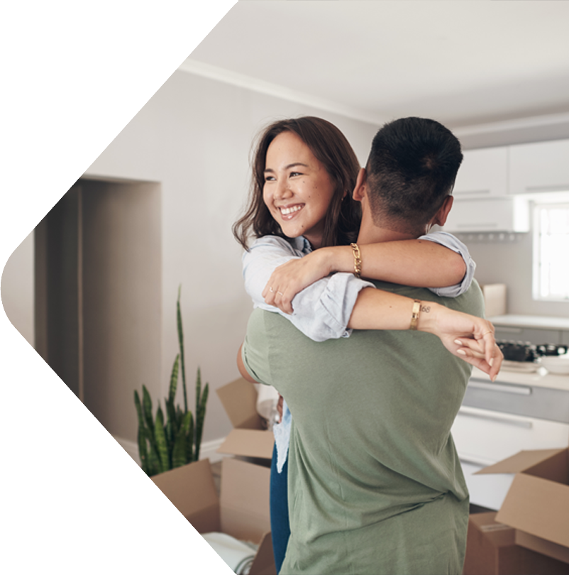 Image showing a smiling couple surrounded by boxes