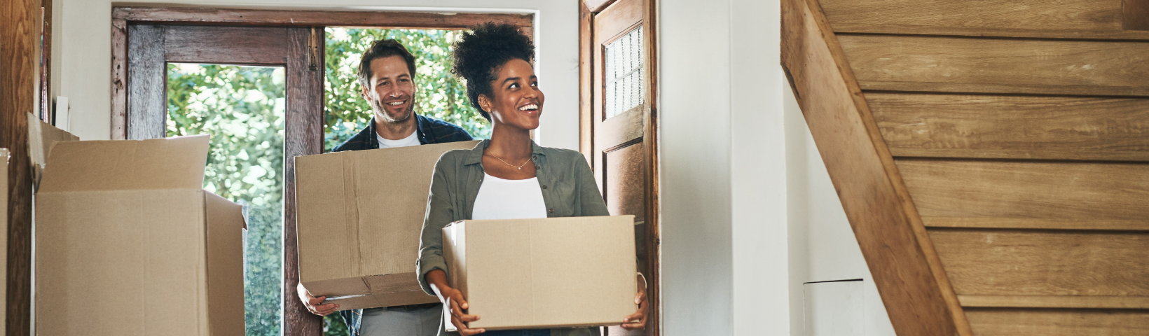 Image showing a couple with boxes in a hallway